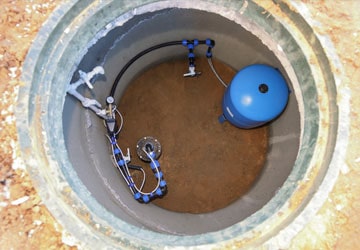 Image looking down into a water well