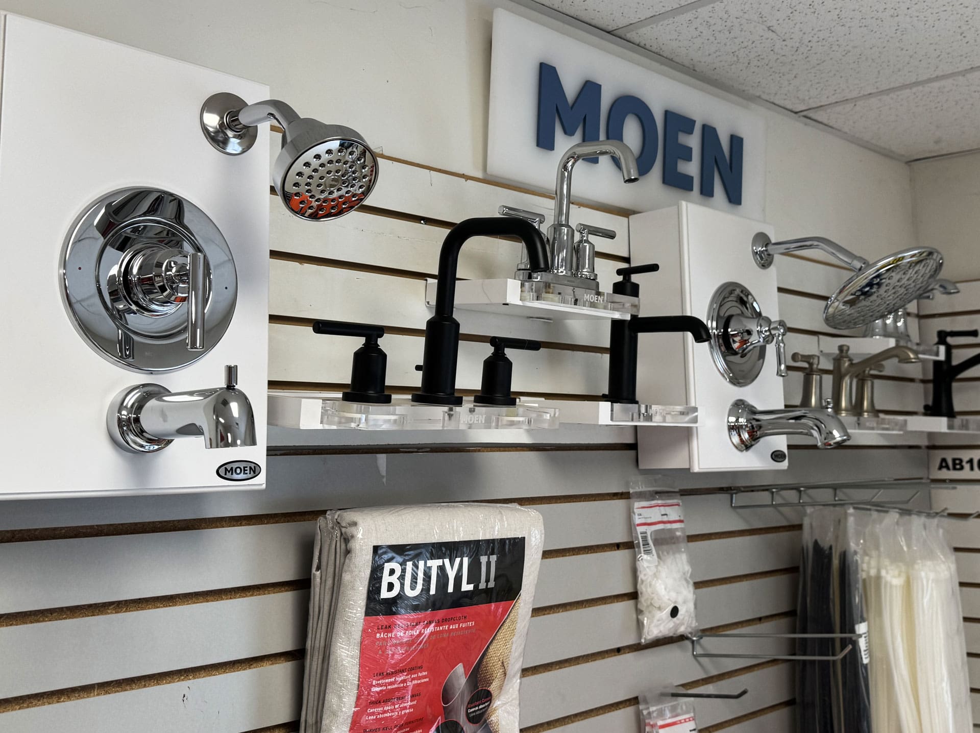 Bathroom faucets and shower heads on display at Weinstein Plumbing Supply Kennett Square