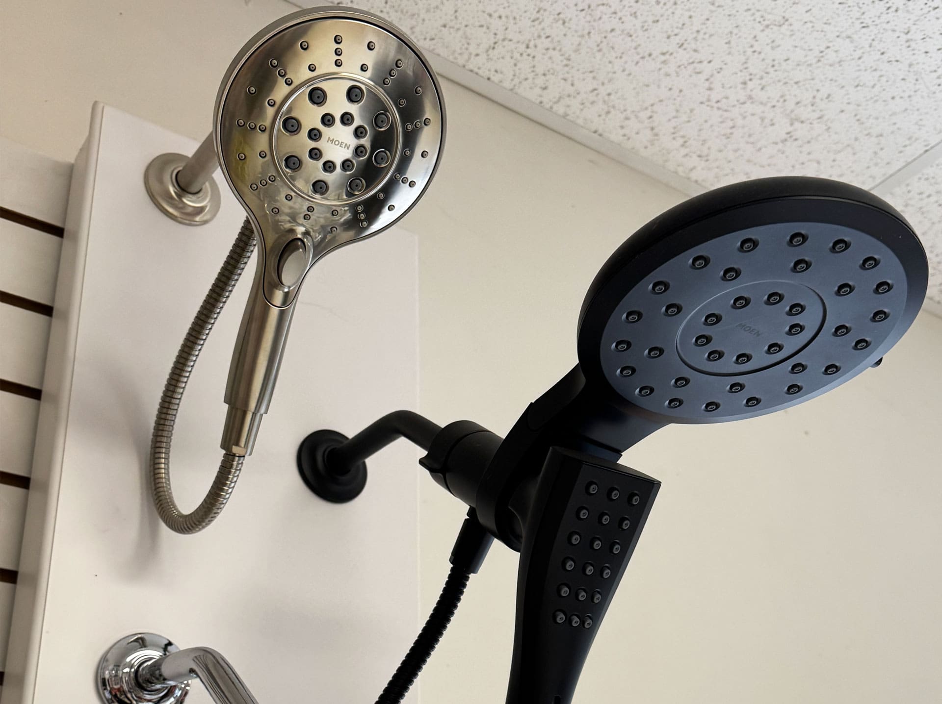 Bathroom shower heads on display at Weinstein Plumbing Supply Kennett Square